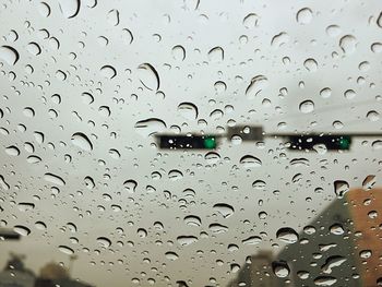 Close-up of water drops on glass