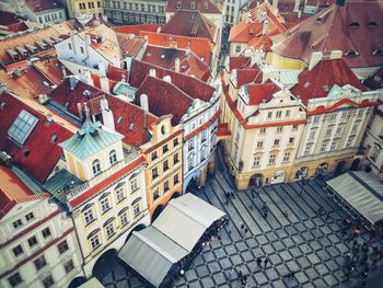 High angle view of street amidst houses in town