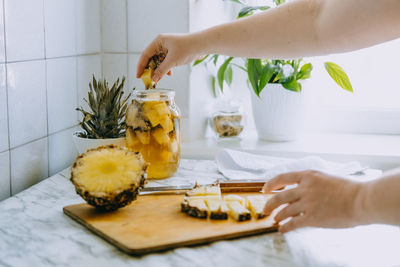 Fermented pineapple kombucha drink tepache. cooking process of homemade probiotic superfood 