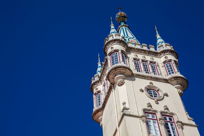 Tower of the sintra town hall building against a beautiful blue sky