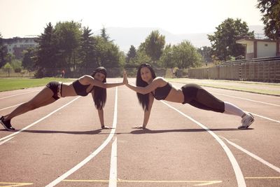 Portrait of women on running track