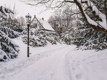 Winter landscape in braunschweig, lower saxony, germany. snow covered walkway after heavy snowfall