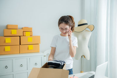 Young woman using smart phone