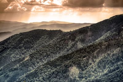 Scenic view of landscape against sky during sunset