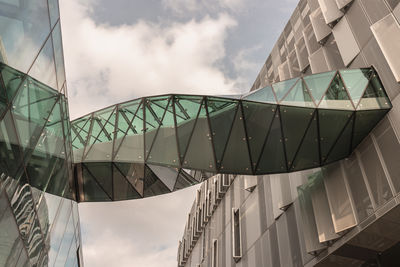 Low angle view of modern buildings against sky