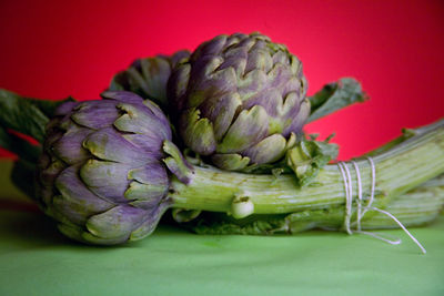Close-up of artichoke on table