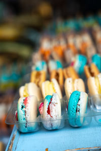 Close-up of multi colored candies on table