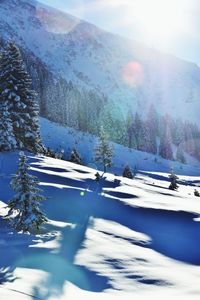 Scenic view of snow covered mountains
