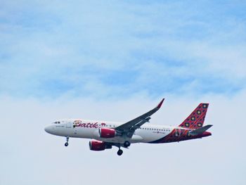 Airplane flying in sky