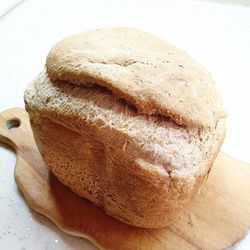 High angle view of bread on cutting board