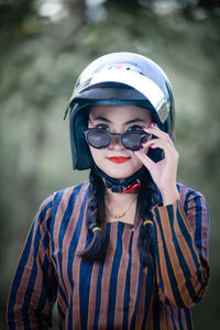 Portrait of young woman wearing hat