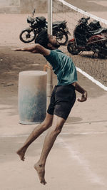 Volleyball player striking the ball