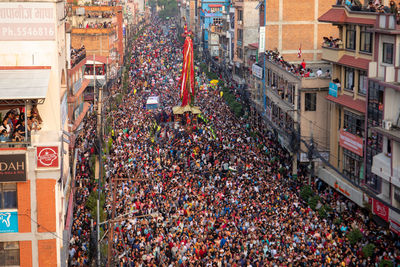 Devotees pull chariots as they take part in the festivities to mark the rato machindranath chariot.