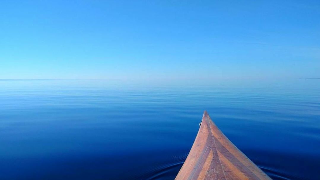 SCENIC VIEW OF BLUE SEA AGAINST CLEAR SKY