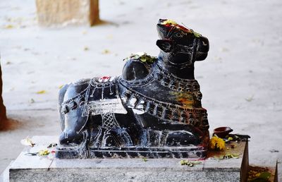 Close-up of statue against fountain