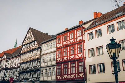 Low angle view of buildings against clear sky