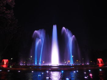 Firework display at night