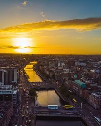 High angle view of bridge over river against sky during sunset