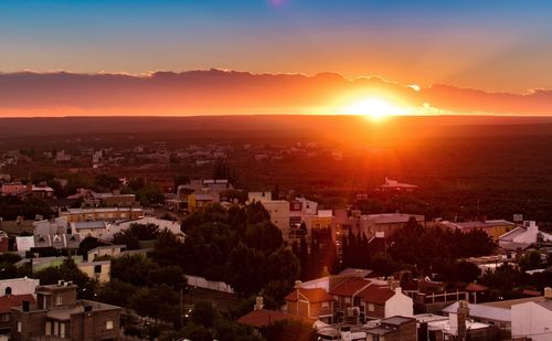 High angle view of townscape against sky during sunset