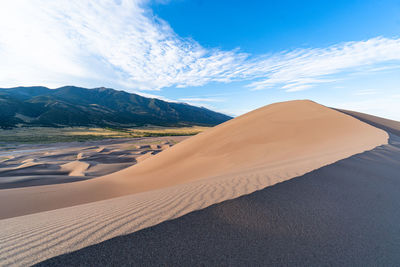 Rim of a sand dune at great sand dunes national park colorado