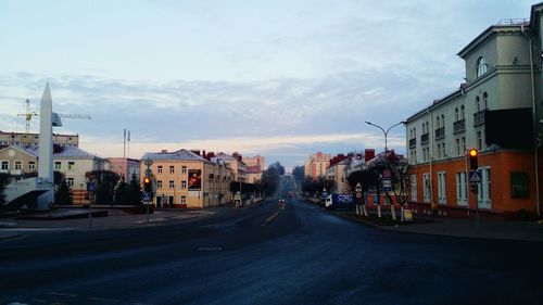 Road in city against sky