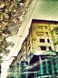 Buildings reflecting in water