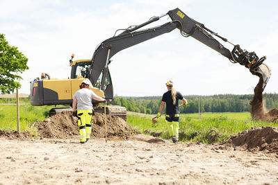 Men working on field