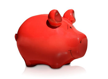 Close-up of red paint over white background