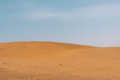 Scenic view of desert against sky