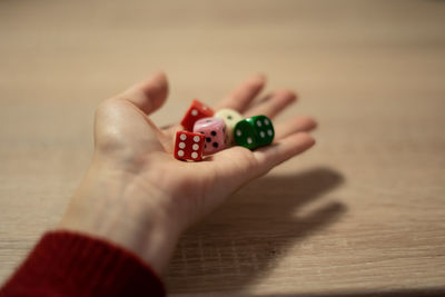Female hand with dices