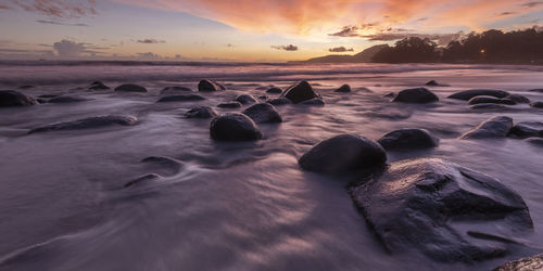 Scenic view of sea against sky during sunset