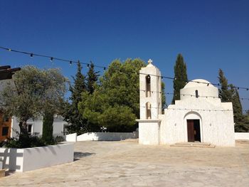 Low angle view of temple against blue sky