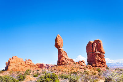 Rock formations against blue sky