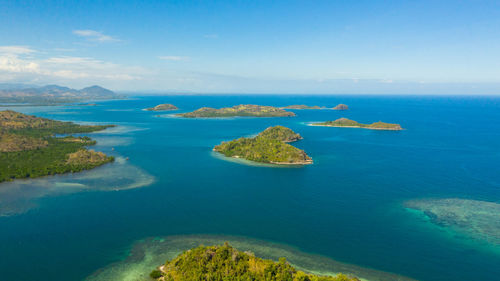 Aerial drone of group of tropical islands with beaches on the zamboanga peninsula. sallangan islands