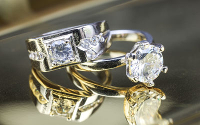 Close-up of wedding rings on table