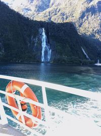 Scenic view of sea by mountain