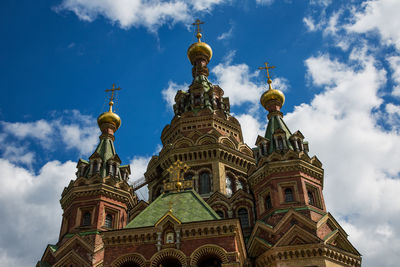 Low angle view of peter and paul cathedral against sky in city