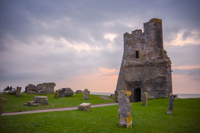 Old ruin building against sky during sunset