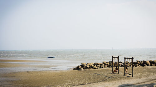 Scenic view of sea against clear sky