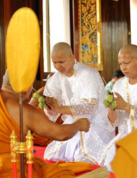 Monks having ordination ceremony at temple