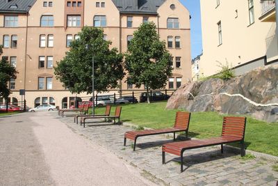 Empty benches in a row