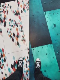 Low section of man standing on floor