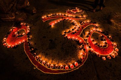 High angle view of illuminated lighting equipment on table