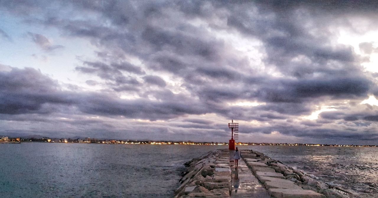 PIER OVER SEA AGAINST SKY