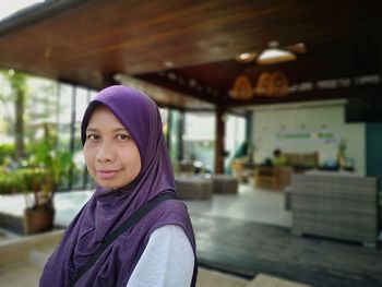 Portrait of smiling woman in hijab