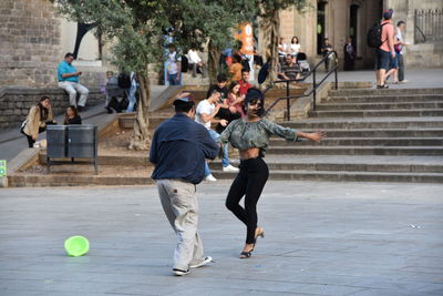 People playing with ball in background