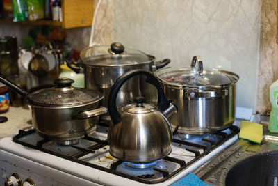 Close-up of cooking pan on barbecue at home