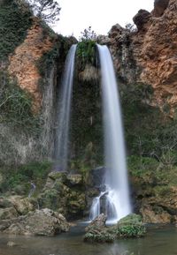 View of waterfall in forest
