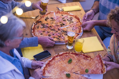 High angle view of people on table