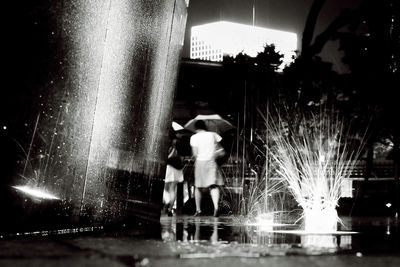 Full length of woman at night